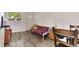Living room featuring a couch, hardwood floors, window and dinning set at 2955 N Gilpin St, Denver, CO 80205
