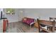Bright living room with wood-look floors, a large window, and comfortable furnishings at 2955 N Gilpin St, Denver, CO 80205