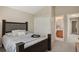 Relaxing main bedroom with closet and bathroom view, featuring soft textures and natural light at 9564 Cordova Dr, Highlands Ranch, CO 80130