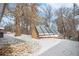 Exterior of a snow-covered greenhouse in backyard at 2842 S Newport St, Denver, CO 80224