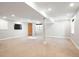 Finished basement featuring carpet, recessed lighting, and a window at 2451 S Fenton Dr, Lakewood, CO 80227