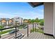 Balcony view overlooking the neighborhood with street views at 1284 Tennyson St # 1, Denver, CO 80204