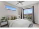 Comfortable main bedroom with balcony access and abundant natural light at 1284 Tennyson St # 1, Denver, CO 80204