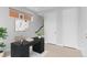 A modern office space with a black desk, white walls, and minimalist decor at 1284 Tennyson St # 1, Denver, CO 80204