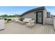 Rooftop patio furnished with modern outdoor seating offering a stylish space for relaxation and social gatherings at 1284 Tennyson St # 1, Denver, CO 80204