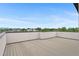 Spacious rooftop terrace with sleek decking offering an open-air space for outdoor enjoyment and cityscape views at 1284 Tennyson St # 1, Denver, CO 80204