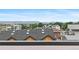 Features a picturesque view of mountains and the neighborhood from a rooftop perspective at 1284 Tennyson St # 1, Denver, CO 80204