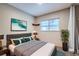 Cozy bedroom with a large window and ceiling fan at 10441 Routt Ln, Broomfield, CO 80021