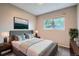 Inviting bedroom with a large window and neutral walls at 10441 Routt Ln, Broomfield, CO 80021