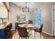 Cozy dining area with wood floors and light fixture at 10441 Routt Ln, Broomfield, CO 80021