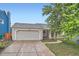Charming single Gathering home with a two car garage, brick accents and inviting front porch at 10441 Routt Ln, Broomfield, CO 80021