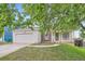 Charming single Gathering home with a two car garage, brick accents and inviting front porch at 10441 Routt Ln, Broomfield, CO 80021