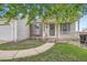 Charming single Gathering home with a brick accents and inviting front porch at 10441 Routt Ln, Broomfield, CO 80021