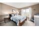 Charming bedroom with a comfortable bed and window at 8445 Braun Loop, Arvada, CO 80005