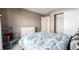 Bright bedroom with double closet and rocking chair at 8445 Braun Loop, Arvada, CO 80005