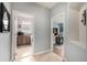 Hallway with laundry room and home office at 8445 Braun Loop, Arvada, CO 80005