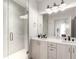 The bathroom has a luxurious shower with unique tilework, modern vanity, and great lighting at 1941 Hooker St, Denver, CO 80204