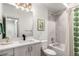 This bathroom is complete with modern fixtures, a tub, and a stylish vanity with a sleek sink at 1941 Hooker St, Denver, CO 80204