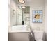 Bathroom features a modern sink, vanity and breakfast themed art at 1941 Hooker St, Denver, CO 80204