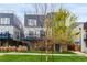 Attractive two-story home with brick accents, a private balcony, and lovely green space, perfect for outdoor enjoyment at 1941 Hooker St, Denver, CO 80204