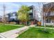 Beautifully designed home featuring a private balcony, lush landscaping, and a serene outdoor setting at 1941 Hooker St, Denver, CO 80204