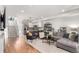 Open concept living space featuring a modern kitchen, cozy living area, and stylish decor, perfect for entertaining at 1941 Hooker St, Denver, CO 80204