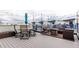 Inviting rooftop deck with outdoor seating, perfect for entertaining with city views and cozy lighting at 1941 Hooker St, Denver, CO 80204