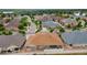 Areal view of a residential neighborhood showcasing the landscape and home with brown roof, backyard, and partial privacy fence at 4400 S Ensenada St, Aurora, CO 80015