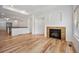 Cozy living room showcases a fireplace and hardwood floors at 4400 S Ensenada St, Aurora, CO 80015