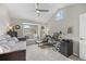 Bedroom with a workspace, window seat, modern ceiling fan, and a cozy daybed at 2528 Concord Cir, Lafayette, CO 80026