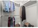 Organized walk-in closet with clothing racks and shoe storage providing efficient space at 2528 Concord Cir, Lafayette, CO 80026