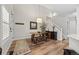 Open concept dining area featuring a modern table, a beautiful staircase, and stylish decor at 2528 Concord Cir, Lafayette, CO 80026