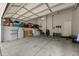 Spacious two car garage with ample storage space for vehicles, tools and equipment at 2528 Concord Cir, Lafayette, CO 80026