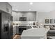 Kitchen featuring granite countertops, stainless steel appliances and gray cabinets, perfect for any home chef at 2528 Concord Cir, Lafayette, CO 80026