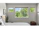 Bright main bedroom features oversized windows with lovely views at 2528 Concord Cir, Lafayette, CO 80026