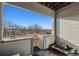 Private balcony providing a peaceful retreat with views of trees and parking at 9291 Twenty Mile Rd # 106, Parker, CO 80134