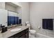 Clean bathroom featuring modern fixtures, a vanity, and a toilet with tiled floors at 9291 Twenty Mile Rd # 106, Parker, CO 80134