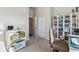 Bedroom featuring closet with built in bookshelves at 9291 Twenty Mile Rd # 106, Parker, CO 80134