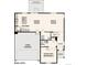 This home's main level floor plan features an open concept kitchen, dining, and great room area at 4265 Gozzer Ranch Dr, Elizabeth, CO 80107