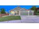 Charming home with a three-car garage and well-maintained lawn at 1838 Mountain Daisy Ct, Highlands Ranch, CO 80129