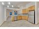 Spacious kitchen showcases stainless steel appliances and a modern design for cooking and entertaining at 1838 Mountain Daisy Ct, Highlands Ranch, CO 80129