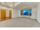 Open living room with hardwood entry and large bay window at 1838 Mountain Daisy Ct, Highlands Ranch, CO 80129