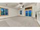 Bright living room features a fireplace, lots of natural light, and sliding glass doors at 1838 Mountain Daisy Ct, Highlands Ranch, CO 80129