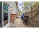 Outdoor patio with outdoor seating and access to the yard at 4663 S Lowell Blvd, Denver, CO 80236