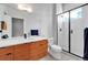 Contemporary bathroom with sleek cabinets, modern shower, and pristine white tile at 3043 W 19Th Ave, Denver, CO 80204