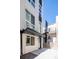 Modern townhome exterior featuring clean lines, large windows, and a private entrance with contemporary design elements at 3043 W 19Th Ave, Denver, CO 80204