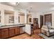 Kitchen featuring stainless steel appliances, breakfast bar and open floor plan at 1210 E Colfax Ave # 206, Denver, CO 80218