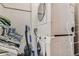 Efficient laundry area with stacked washer and dryer units at 1210 E Colfax Ave # 206, Denver, CO 80218