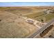 Large rural property with a home, barn, and sprawling acreage at 16491 County Road 32, Platteville, CO 80651