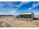 Large metal barn on a rural property at 16491 County Road 32, Platteville, CO 80651